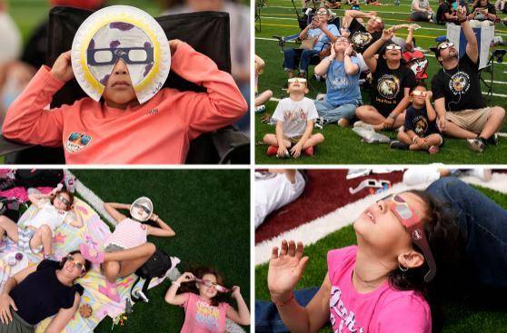 当地时间4月8日，得州的儿童和家人一起观赏日食 图自美媒